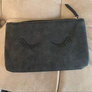 Stela & Dot small accessories bag, black eyelashes
